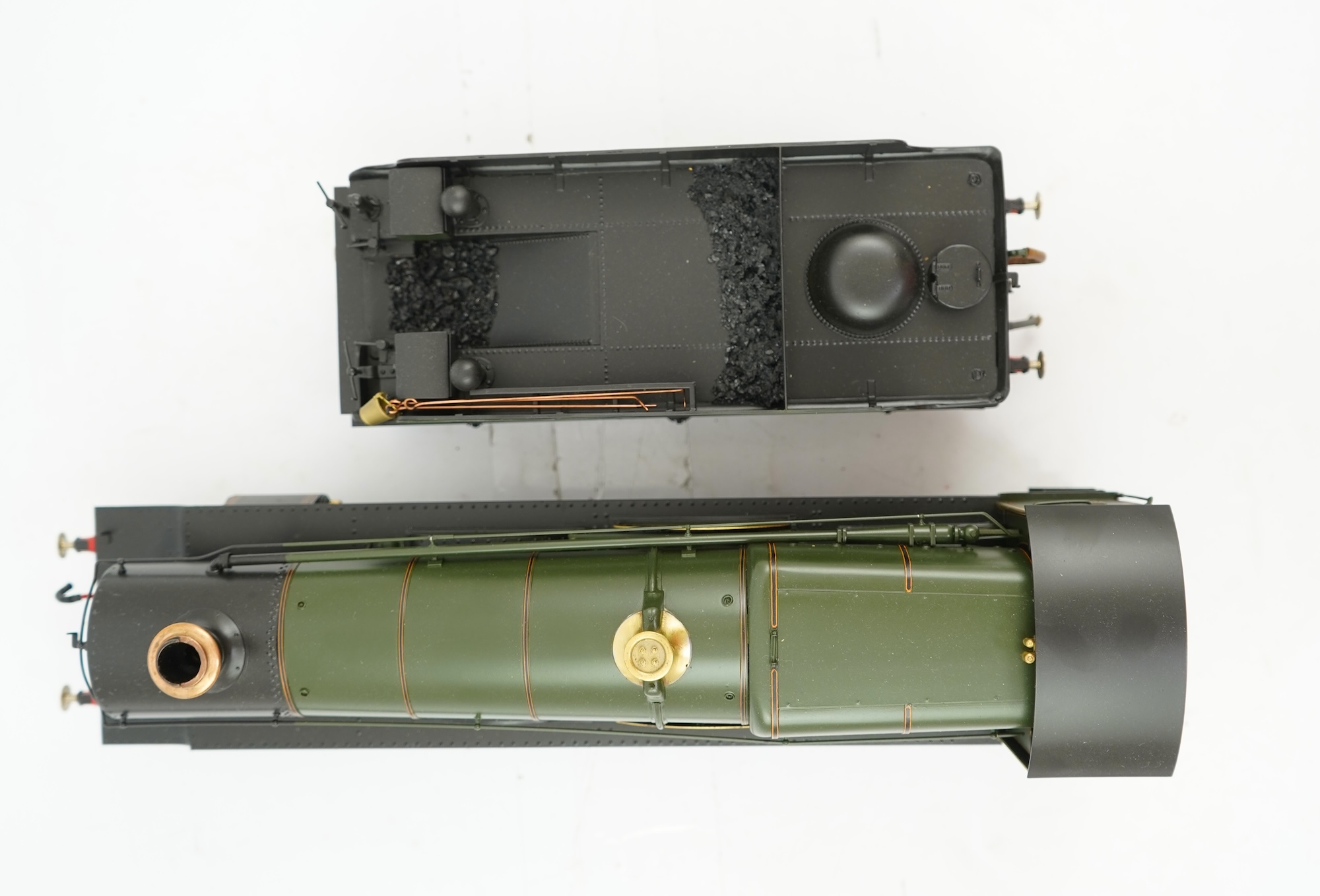 A Gauge One model of GWR Saint Class Fawley Court 2942, 4-6-0 tender locomotive, the model is unpowered, possibly to allow for the detailing between the frames.